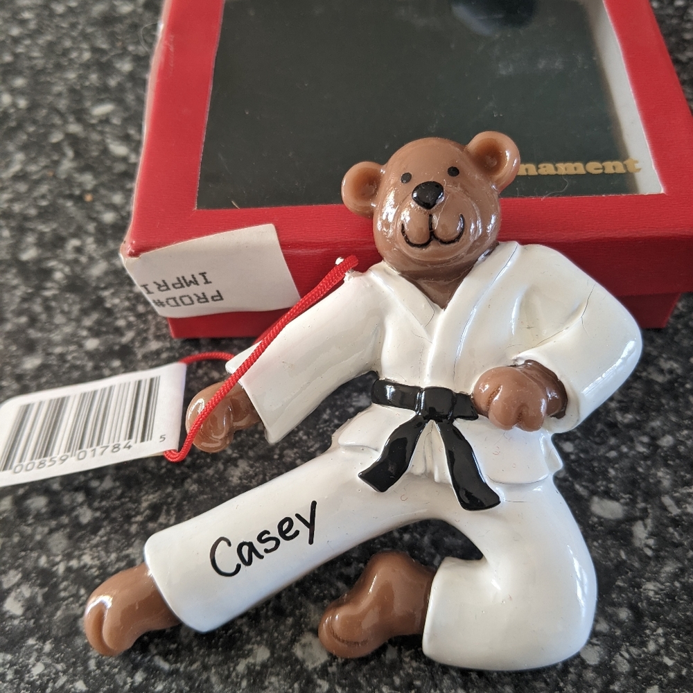 Karate ornament and small duffel bag with name Casey imprinted on them